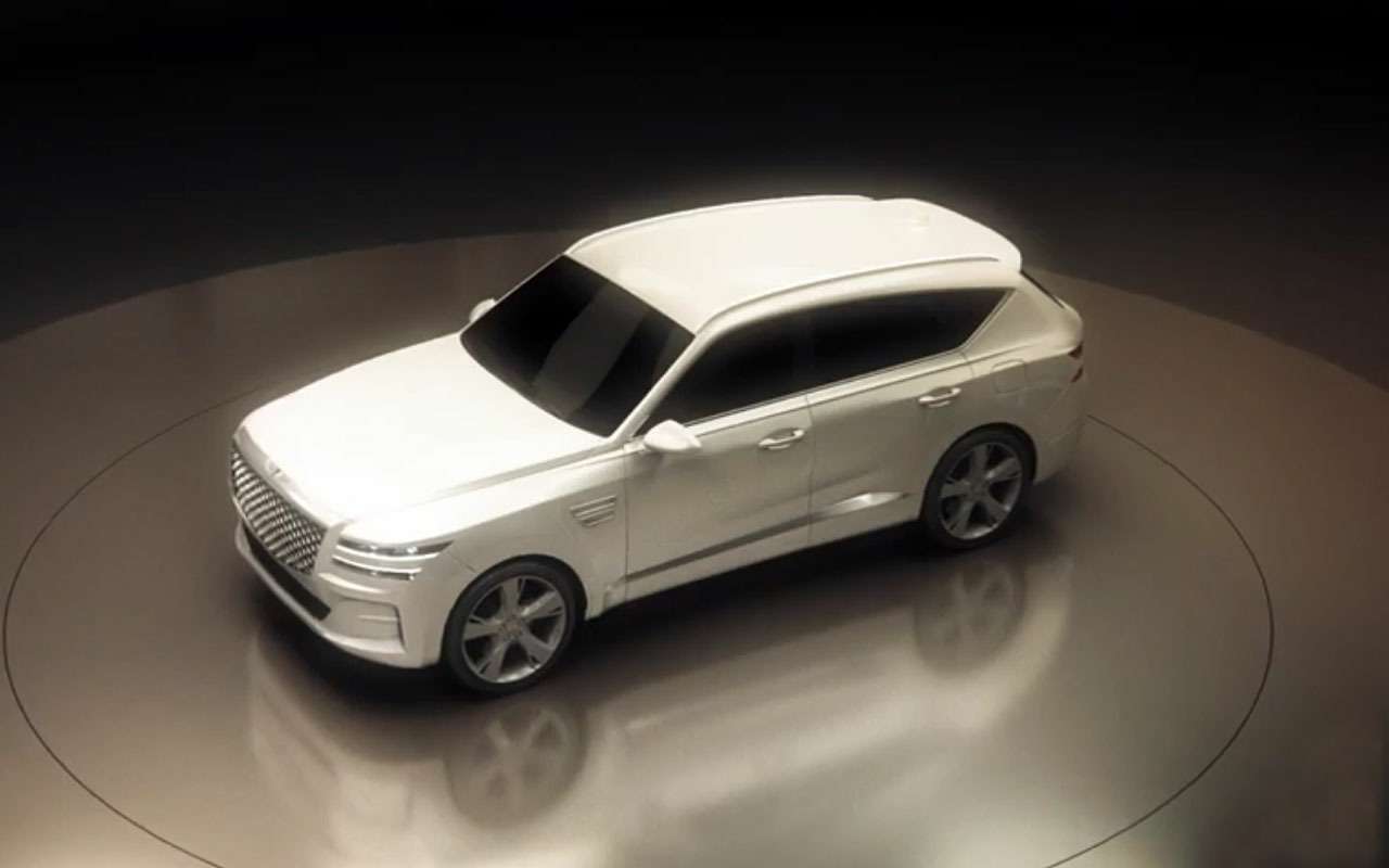 Появились первые фото кроссовера Genesis. И исчезли