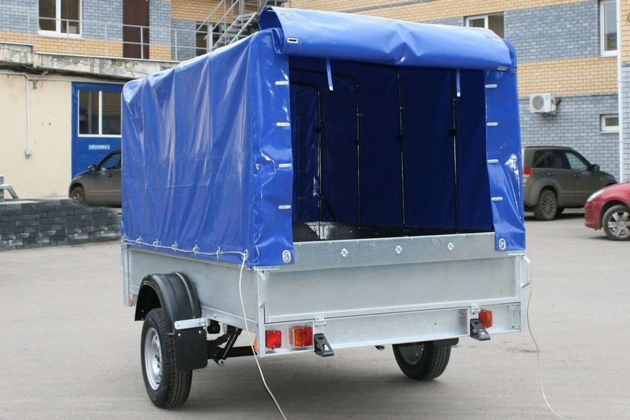 Какой прицеп лучше - с тентом или пластиковой крышкой?