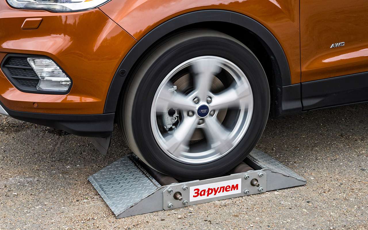 камень под колесо. траки для бездорожья. под колеса машины. человек в колесе. Tra9009 тележка-домкратная, под колесо 660кг, 620х620х220мм, ход l=225мм.