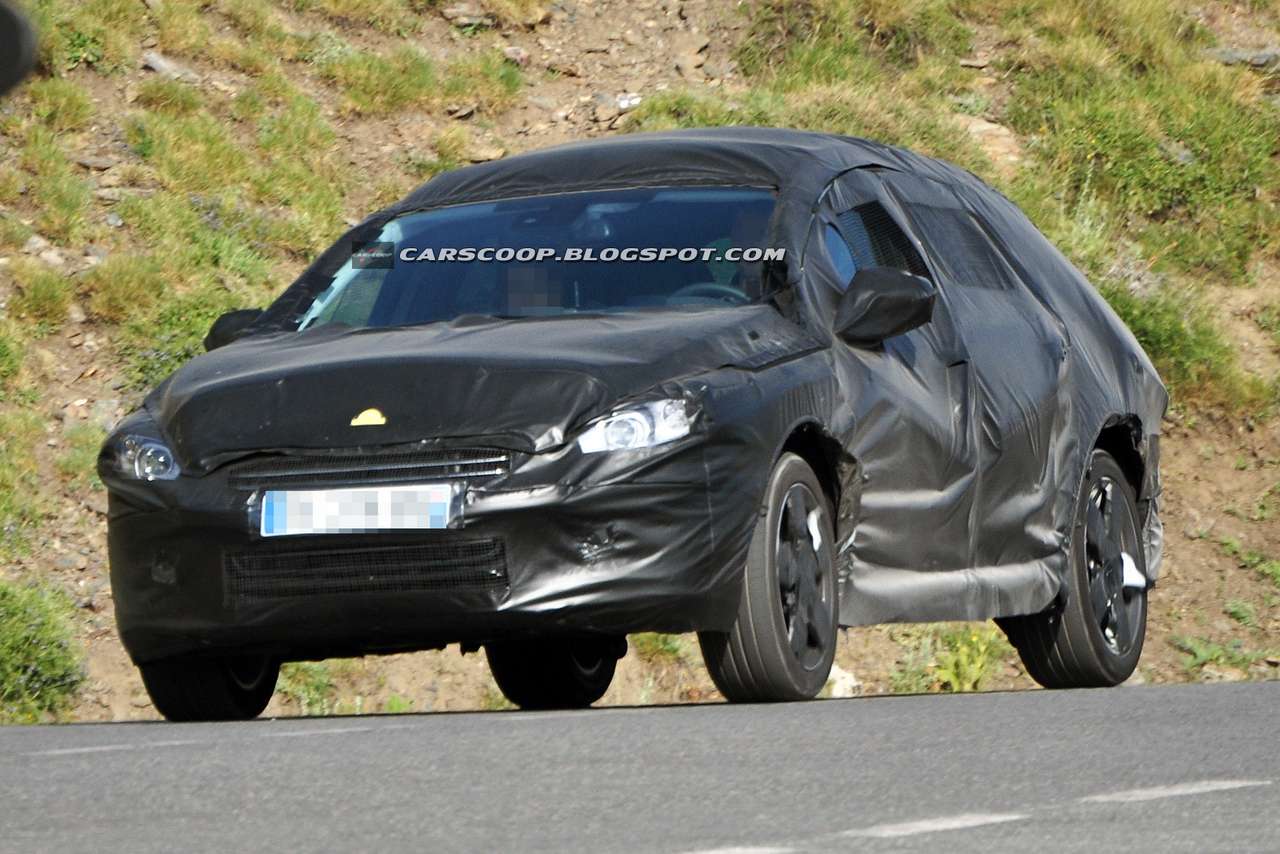 Папарацци засекли Peugeot 508 Outdoor в камуфляже