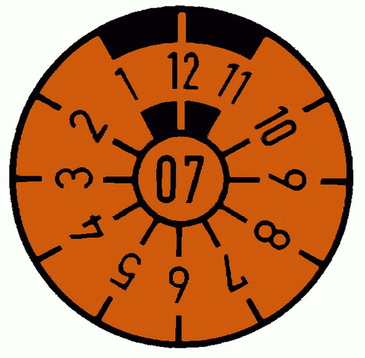 Так наклейка TÜV-Wapperl выглядит вблизи. Данная обозначает, что автомобиль можно эксплуатировать до конца декабря 2007 года. Фото: Wikipedia