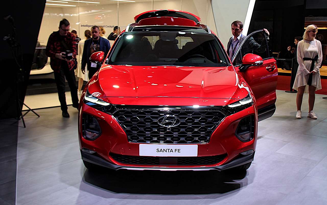 Лучшая новинка 2022. Hyundai Santa Fe 2022 красный. Hyundai Santa Fe 2021 красный. Хёндай Санта Фе 2022 новый. Хёндай Санта Фе 2020 красный.