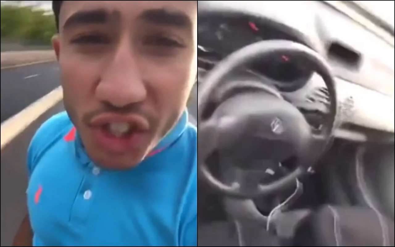 Безбашенный водитель залез на крышу автомобиля во время езды