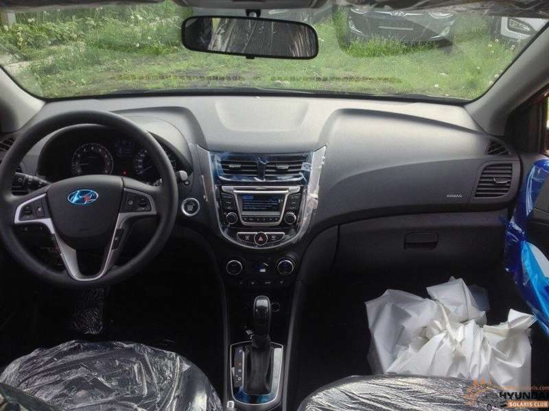 Hyundai solaris 2014 седан салон. Hyundai solaris 2014 интерьер. Хендай солярис 2016 седан салон. Солярис 2012 седан белый салон. Hyundai solaris 2015 interior.