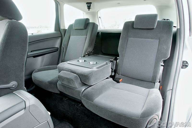 Сиденья третий ряд ford c max grand-2. Ford s-max салон в коричневой коже. Сиденье c max. Сиденье c max. Форд с мах 3 ряд сидений.