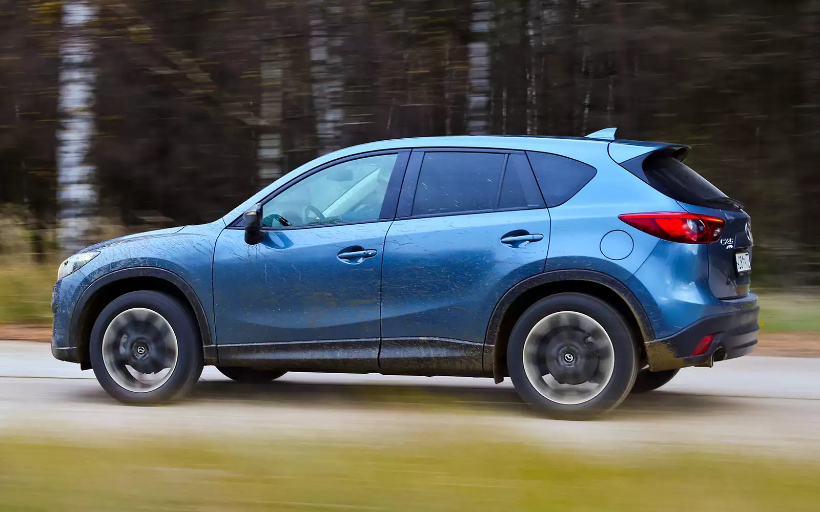 Клиренс мазда 5. Mazda CX 5 клиренс. Мазда СХ-5 синяя.